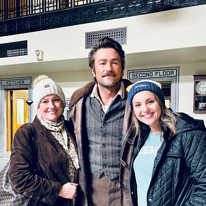 BNSF Director of External Communications Kendall Sloan, right, with her mother, Stacey Kirkham, and Brandon Sklenar, who plays Spencer Dutton in “1923” BNSF Director of External Communications Kendall Sloan, right, with her mother, Stacey Kirkham, and Brandon Sklenar, who plays Spencer Dutton in “1923”