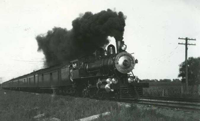 A CB&Q train travelling at full speed toward Chicago A CB&Q train travelling at full speed toward Chicago