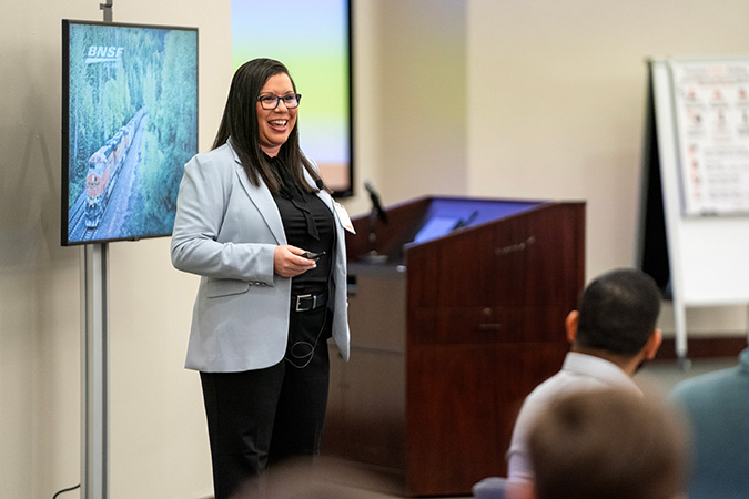 Chief Diversity and Inclusion Officer Kalisha Holland addresses attendees in her welcoming remarks. Chief Diversity and Inclusion Officer Kalisha Holland addresses attendees in her welcoming remarks.