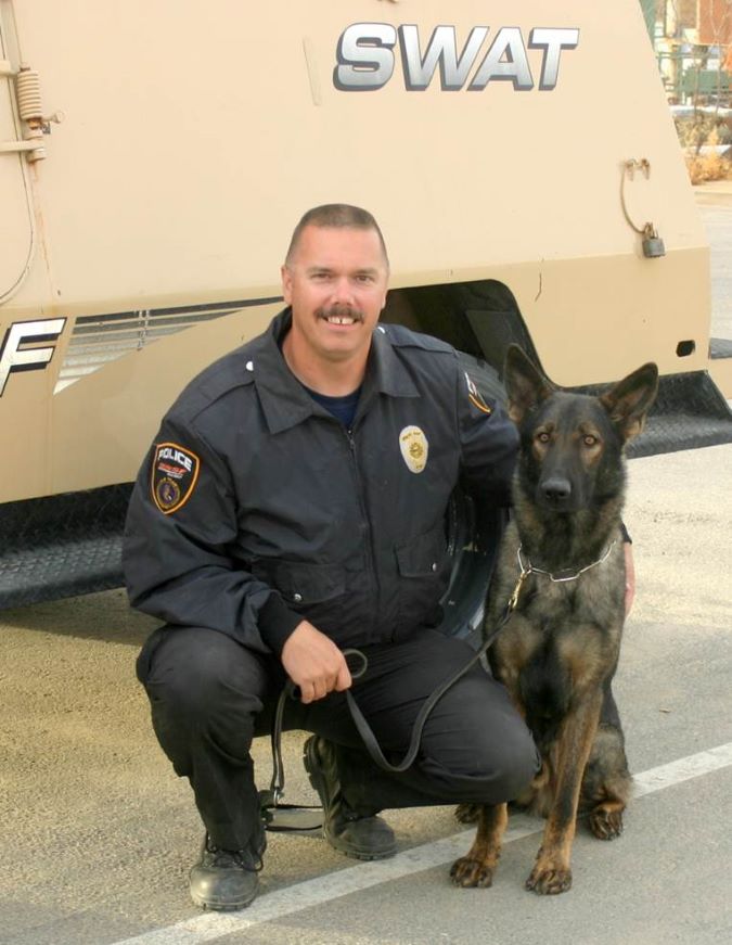 Schaffer and Faust near a SWAT vehicle. Schaffer and Faust near a SWAT vehicle.