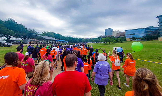 BNSF employees and their families participating in the walk. BNSF employees and their families participating in the walk.