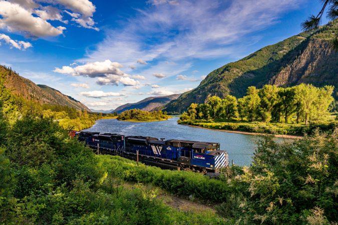 A MRL locomotive traveling through a mountain valley A MRL locomotive traveling through a mountain valley