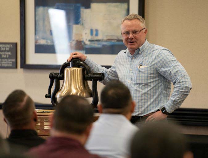 Executive Vice President and Chief Operations Officer Matt Igoe at a bell presentation. Executive Vice President and Chief Operations Officer Matt Igoe at a bell presentation.