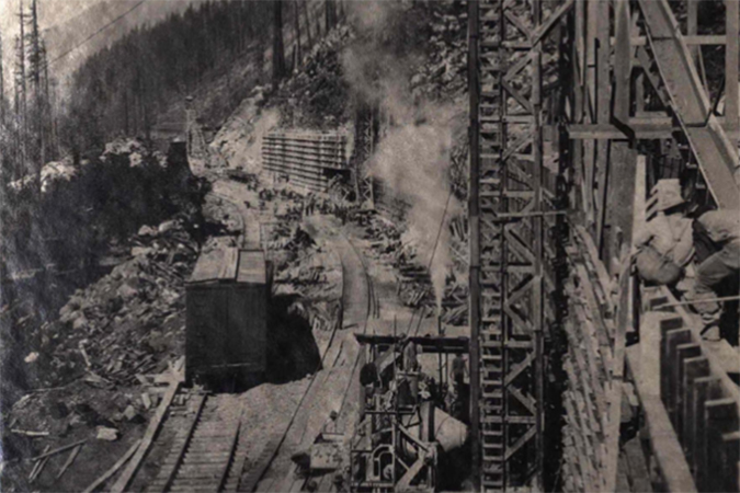 Construction on a 778-foot double track to replace an old snow shed in 1913 near Windy Point. Construction on a 778-foot double track to replace an old snow shed in 1913 near Windy Point.