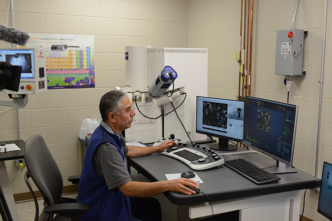 Senior Engineer I Huseyin Guzel performs chemical analysis of residue found in traction motors using a Scanning Electron Microscope (SEM)/Energy Dispersive Spectroscopy (EDS). Senior Engineer I Huseyin Guzel performs chemical analysis of residue found in traction motors using a Scanning Electron Microscope (SEM)/Energy Dispersive Spectroscopy (EDS).