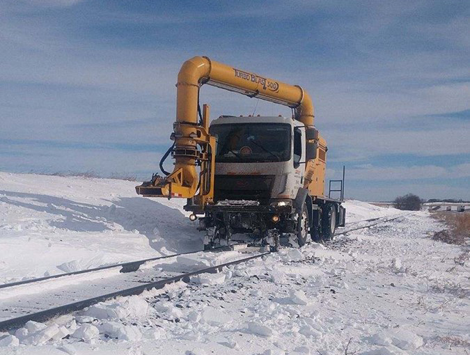 When the snow is dry, a blower can remove top layers. When the snow is dry, a blower can remove top layers.